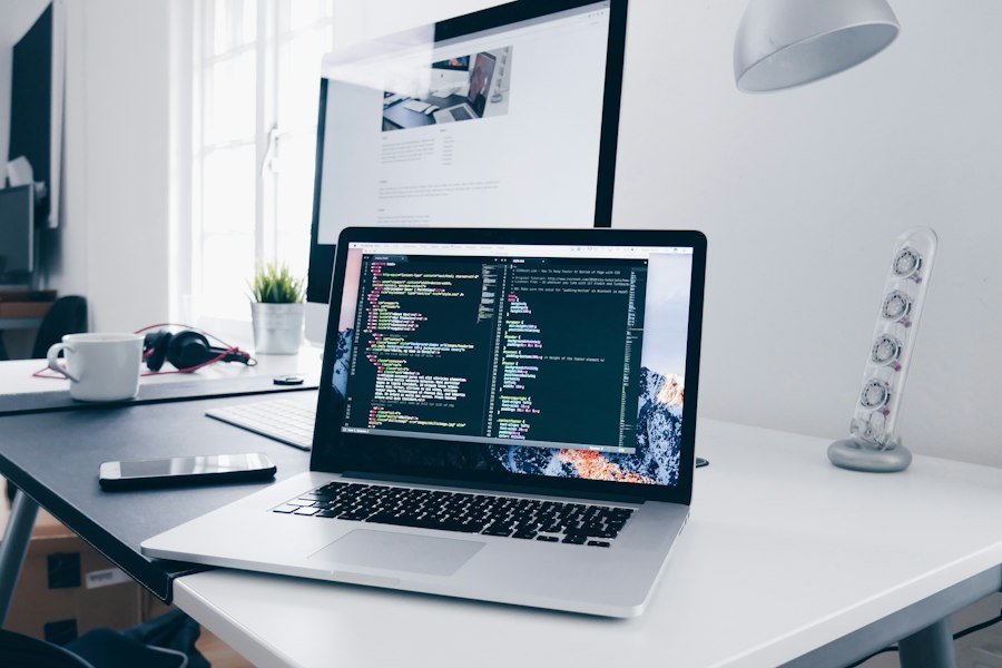 Laptop and desktop workspace for building websites